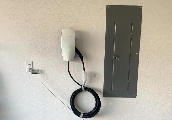 ev charger on garage wall